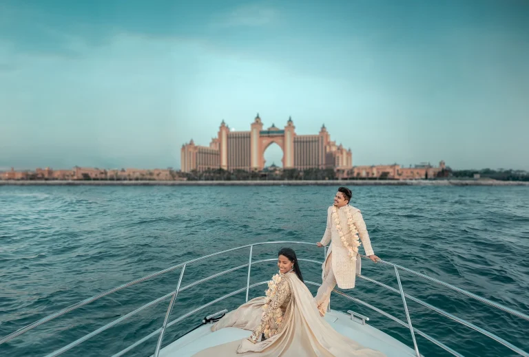 Couple getting married on a yacht wearing Indian Traditional Sherwani and Saree in Arabian Sea blu 1 1