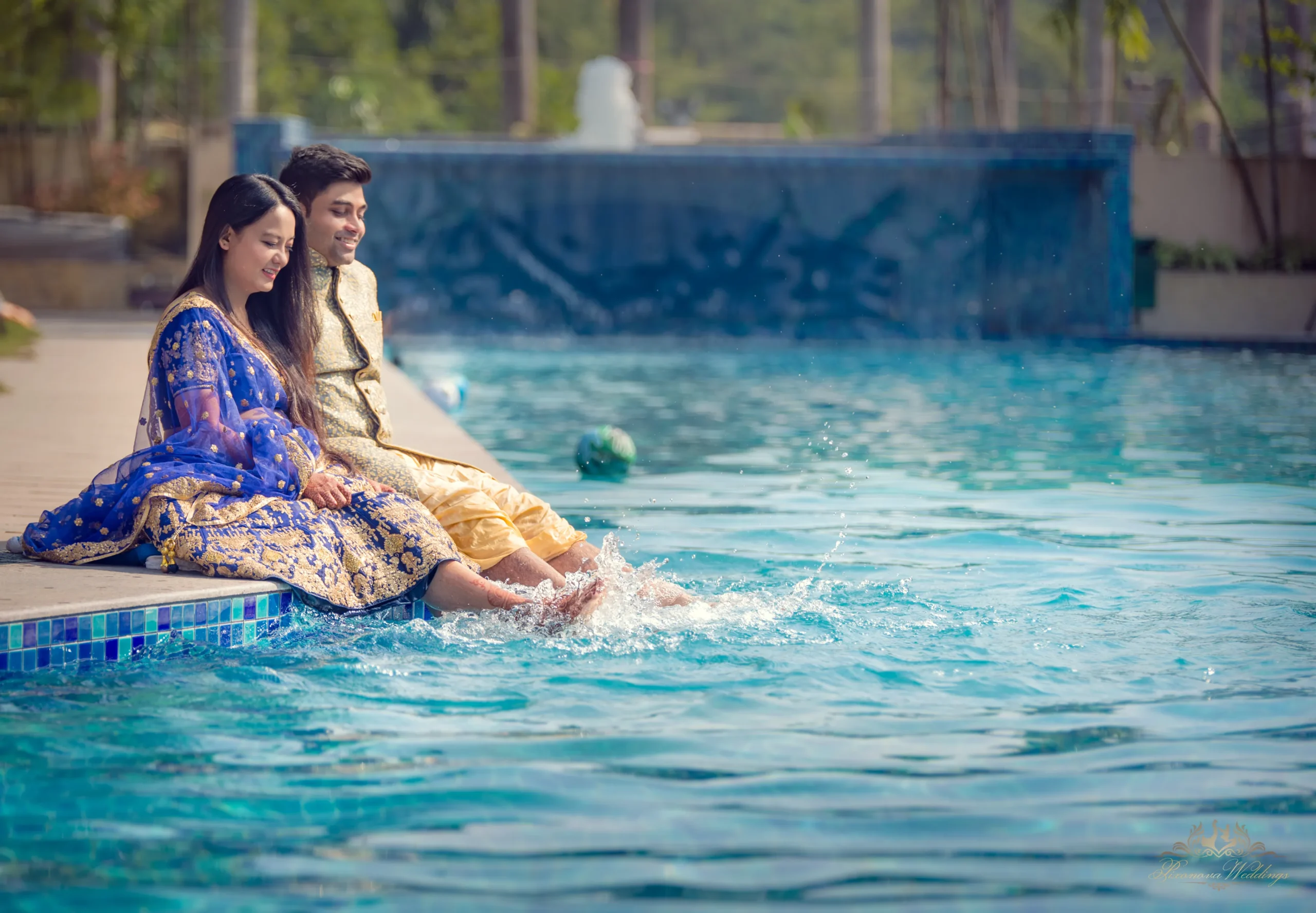 Telegu Wedding Couple Sitting near swimming pool Ibiza resort destination wedding P010064 Edit 1 scaled 1